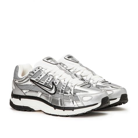 Nike metallic silver shoes